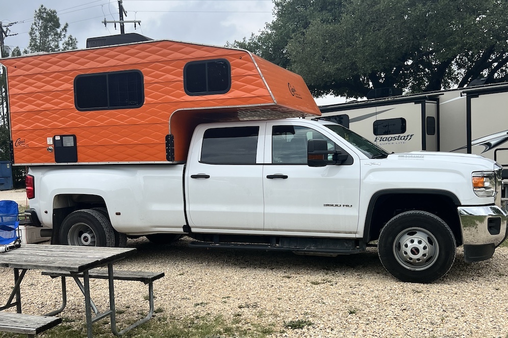 Orange Capri Truck Camper